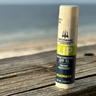 Watermans LIP ICE SPF 15 lip balm in use outdoors